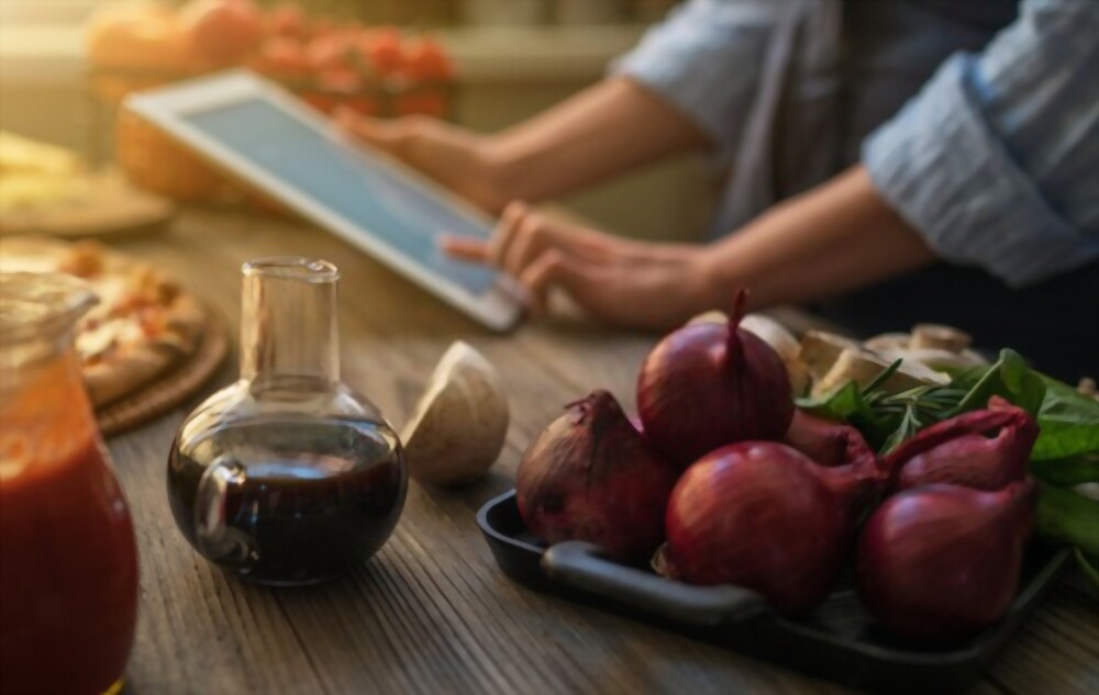 Person Pouring Salt in Bowl